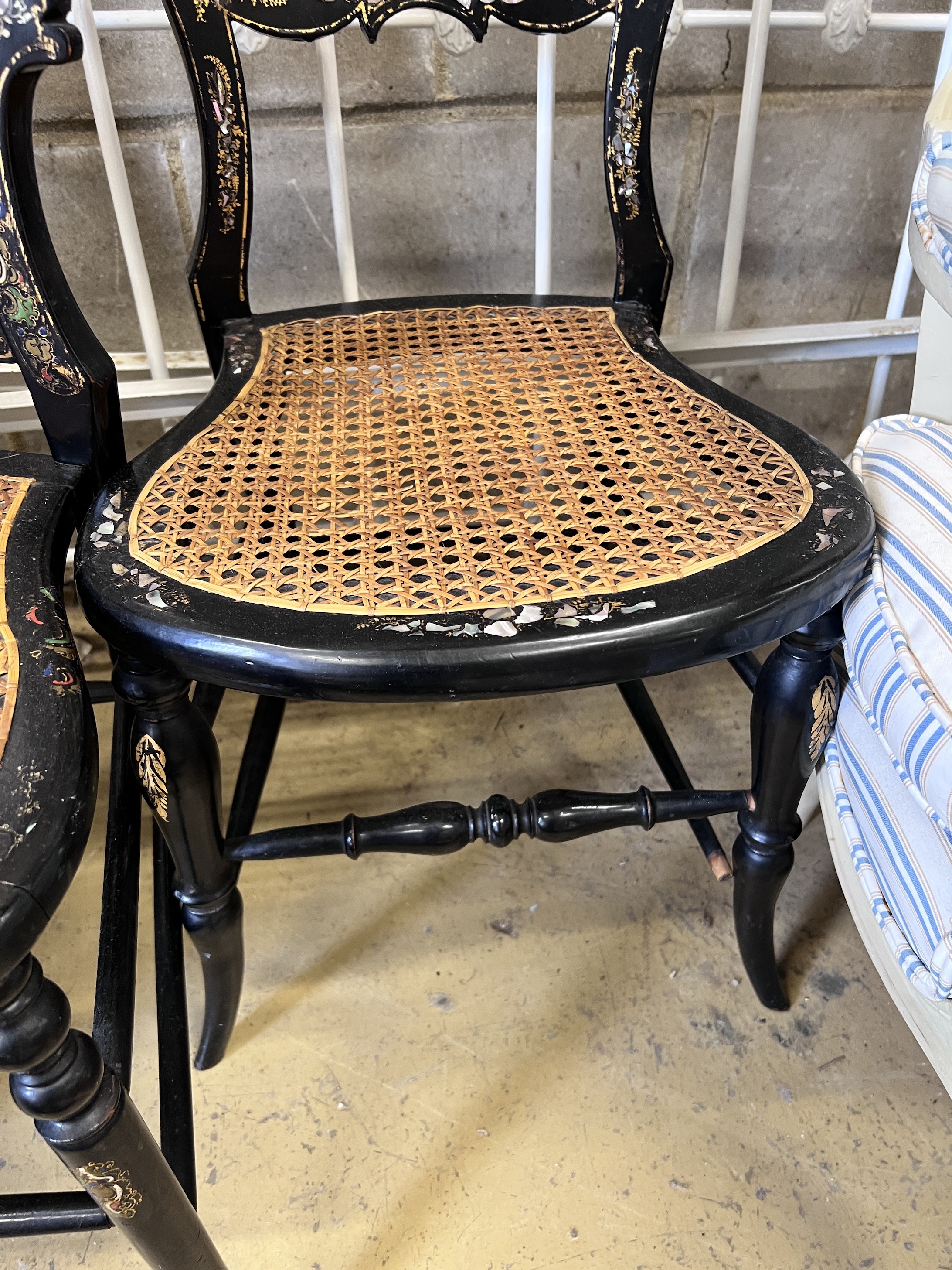 A pair of Victorian mother of pearl inlaid papier mache and ebonised salon chairs, height 85cm